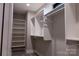 Well-organized walk-in closet with built-in shelving and ample hanging space at 113 Angler Pl, Mooresville, NC 28117