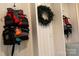 Functional mud room with multiple life vests hung neatly on a white paneled wall at 113 Angler Pl, Mooresville, NC 28117