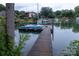 Private boat dock with personal watercraft parking providing easy access to lake activities at 113 Angler Pl, Mooresville, NC 28117