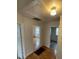 Hallway showcasing hardwood floors and multiple entryways at 1217 Spruce St, Charlotte, NC 28203