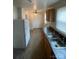 Functional kitchen with stainless steel sink and ample counter space at 1217 Spruce St, Charlotte, NC 28203