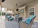 Covered patio with seating area and fire pit at 1903 Robbins Meadows Dr, Waxhaw, NC 28173