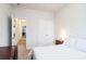 Well-lit bedroom with double doors to closet and hallway at 2019 Stoney Point Cir, Monroe, NC 28112