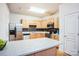 Kitchen features stainless steel appliances and light wood cabinets at 2019 Stoney Point Cir, Monroe, NC 28112