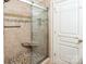 Large walk-in shower with tiled walls and pebble floor at 2019 Stoney Point Cir, Monroe, NC 28112