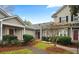 Attractive exterior of townhouses with landscaping and inviting entryways at 2717 New Hamlin Way, Charlotte, NC 28210