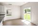 Kitchen nook with sliding glass door leading to backyard at 3259 Maple Ridge Dr, Gastonia, NC 28052