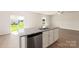 Modern kitchen island with stainless steel appliances and granite countertops at 3259 Maple Ridge Dr, Gastonia, NC 28052