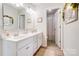 Double vanity bathroom with a separate shower and toilet at 3594 Cerelia Ln, Denver, NC 28037