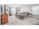 Main bedroom with plush carpet and plenty of natural light at 3594 Cerelia Ln, Denver, NC 28037