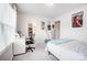 Cozy bedroom with a comfortable bed and built-in workspace at 3594 Cerelia Ln, Denver, NC 28037