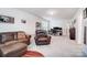 Cozy bonus room features leather seating and a workspace at 3594 Cerelia Ln, Denver, NC 28037