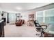 Versatile bonus room with comfortable seating and a workspace at 3594 Cerelia Ln, Denver, NC 28037