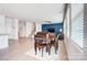 Dining room with a table and chairs, open to the kitchen and living room at 3594 Cerelia Ln, Denver, NC 28037