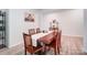 Formal dining room with wood table and chairs at 3594 Cerelia Ln, Denver, NC 28037