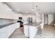 Modern kitchen with white cabinets, granite countertops and island at 3594 Cerelia Ln, Denver, NC 28037