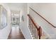 Bright hallway with hardwood floors and view of living room at 3727 13Th Ne St, Hickory, NC 28601