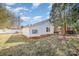 Backyard view showing a detached white shed at 414 W Harvie Ave, Gastonia, NC 28052