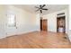 Hardwood floors and white wainscoting in this spacious living room at 414 W Harvie Ave, Gastonia, NC 28052