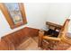 Wooden staircase with intricate details and stained glass window at 414 W Harvie Ave, Gastonia, NC 28052