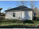 Rear view of house showing a back door and small patio area at 4470 Kingsbury Rd, Midland, NC 28107
