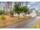 House exterior with driveway and landscaping at 4630 Dawnwood Dr, Charlotte, NC 28212