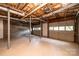 Unfinished basement with double garage doors at 5138 Foley Dr, Hickory, NC 28601