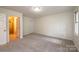 Bedroom with access to bathroom and ample closet space at 5138 Foley Dr, Hickory, NC 28601