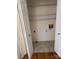 Laundry closet with wire shelving and linoleum floor at 5138 Foley Dr, Hickory, NC 28601