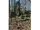 Wooded lot for sale; custom homes available at 5616 Glenkirk Rd # 1, Charlotte, NC 28210
