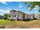 Charming two-story home with a cozy porch and brick detailing at 6037 Pleasant Grove Rd, Charlotte, NC 28216
