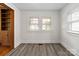 Bright room with original built-ins and ample natural light at 6037 Pleasant Grove Rd, Charlotte, NC 28216