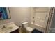 Bathroom with a single sink vanity, toilet and shower/tub combination at 629 S Caldwell St, Salisbury, NC 28144