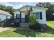 Charming home featuring a cozy front porch with black trim and an American flag at 629 S Caldwell St, Salisbury, NC 28144