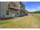 Private backyard with patio and lawn area at 7011 Jane Parks Way, Charlotte, NC 28217