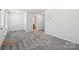 Bright bedroom with gray carpet and an ensuite bathroom at 7011 Jane Parks Way, Charlotte, NC 28217