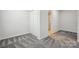 Spacious bedroom with carpet, large closet, and access to a full bathroom at 7011 Jane Parks Way, Charlotte, NC 28217