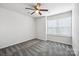 Bright bedroom with ceiling fan and window at 7011 Jane Parks Way, Charlotte, NC 28217