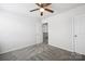 Bedroom with ceiling fan and access to hallway at 7011 Jane Parks Way, Charlotte, NC 28217