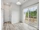 Breakfast nook with sliding glass doors leading to a deck at 7011 Jane Parks Way, Charlotte, NC 28217