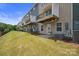 Row of townhouses with private backyards and decks at 7011 Jane Parks Way, Charlotte, NC 28217