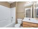 Clean bathroom with tub, toilet and vanity at 7117 Flying Scotsman Dr, Charlotte, NC 28213