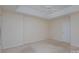 Spacious bedroom with neutral walls and carpet flooring at 7117 Flying Scotsman Dr, Charlotte, NC 28213
