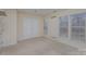 Bright bedroom with double doors and carpet at 7117 Flying Scotsman Dr, Charlotte, NC 28213