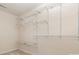 Walk-in closet with built-in shelving provides ample storage space at 7117 Flying Scotsman Dr, Charlotte, NC 28213
