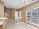 Spacious entryway with stairs and an interior door at 7117 Flying Scotsman Dr, Charlotte, NC 28213