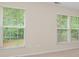 Bright room with large windows offering scenic outdoor views at 7117 Flying Scotsman Dr, Charlotte, NC 28213