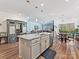 Bright, open kitchen with granite counters, stainless appliances, and seamless flow to living and dining areas at 7522 Porrera St, Charlotte, NC 28214