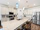 Spacious kitchen featuring granite countertops, stainless steel appliances, and an island at 7522 Porrera St, Charlotte, NC 28214