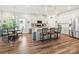 Bright, open kitchen with a large island, stainless steel appliances, and modern pendant lighting at 7522 Porrera St, Charlotte, NC 28214